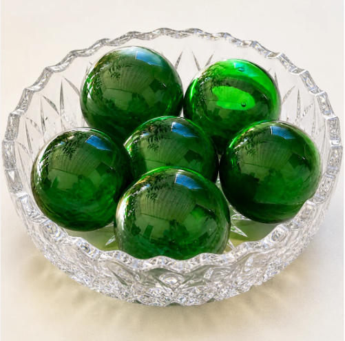 Handcrafted green recycled glass orbs